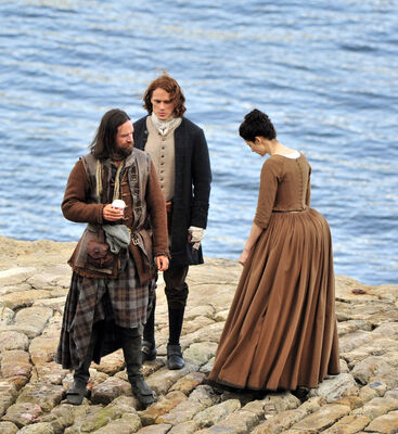 2015_-_Sam_Heughan_Caitriona_Balfe_and_Duncan_Lacroix_filming_01.jpg