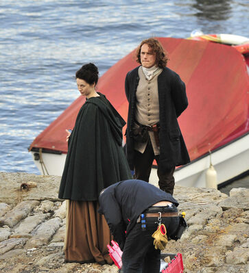 2015_-_Sam_Heughan_Caitriona_Balfe_and_Duncan_Lacroix_filming_03.jpg