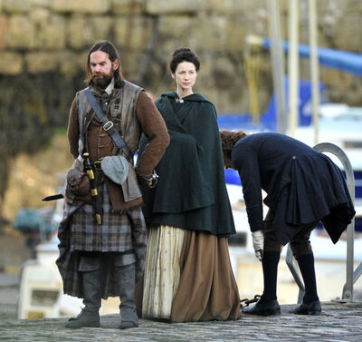 2015_-_Sam_Heughan_Caitriona_Balfe_and_Duncan_Lacroix_filming_09.jpg