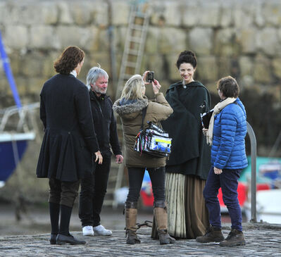 2015_-_Sam_Heughan_Caitriona_Balfe_and_Duncan_Lacroix_filming_12.jpg