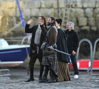 2015_-_Sam_Heughan_Caitriona_Balfe_and_Duncan_Lacroix_filming_13.jpg